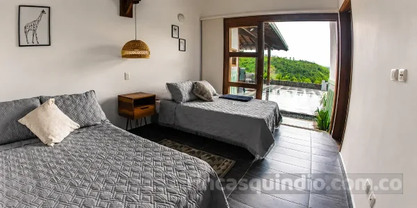 Habitación familiar de Finca Montenegro Flamboyan en Montenegro, Quindío, para descanso de huéspedes