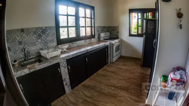 Cocina o terraza social de Finca Quimbaya Anturio, con ambiente campestre